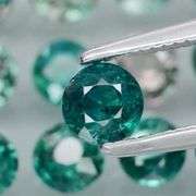 Multi-hue 5.08ct natural blue green Sapphire set