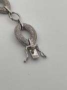 CERTIFIED BRAND NEW 14K WHITE GOLD AND DIAMOND LINK BRACELET.