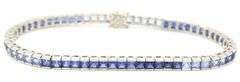 10kt White gold princess cut synthetic sapphire channel set bracelet