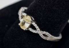 CZ Ring with Small Accent Stones in Sterling Silver 3grams Size 10 3/4