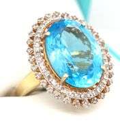 Bewitching Massive 15.80CTS Oval Shaped Millennium-Cut Blue Topaz & 0.95CTW Diamonds in 14K Yellow G