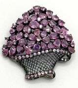 Hand made Italian 18kt  black gold with over 18cttw natural pink and purple sapphire floral arrangem