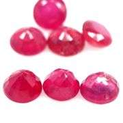 Vibrant 8.12ct round cut imperial red Ruby set