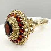 18kt Yellow Gold Oval Garnet & Halo Garnet Ring