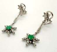 One pair hand made Italian 18KT white gold with 0.72 cttw natural emerald and diamond star motif dan