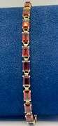14K Yellow Gold Emerald Cut Garnet Tennis Bracelet