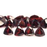 Deep burgundy 14ct trillion cut untreated Garnet set