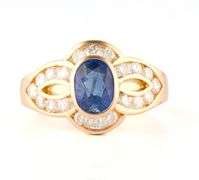 0.65ct Oval Sapphire and 0.25ctw Diamond Frame Ring in 18K