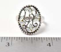 Cut Out Floral Design Ring with White Stones in Sterling Silver 4.1grams Size 7.5