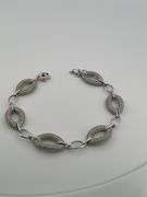 CERTIFIED BRAND NEW 14K WHITE GOLD AND DIAMOND LINK BRACELET.