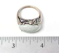 Unique Ring with Light Green Stone and Intricate detailing on Housing in Sterling Silver 8grams Size