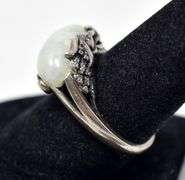 Unique Ring with Light Green Stone and Intricate detailing on Housing in Sterling Silver 8grams Size