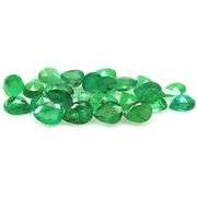 Pear cut 6.56ct Zambian Emerald set