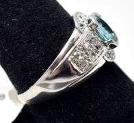 Blue Topaz Ring with Accent Gems in Sterling Silver 4.2grams Size 8 3/4
