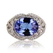 14K WHITE GOLD TANZANITE AND DIAMOND RING 5.19 C.T.W.