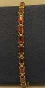 14K Yellow Gold Emerald Cut Garnet Tennis Bracelet