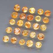 Large 4.40ct round cut yellow and orange Sapphire set! Eye clean!