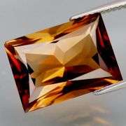 Exquisite 11.61ct whiskey red Imperial Topaz