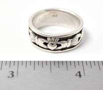 Hand and Heart Ring in Sterling Silver 9.6grams Size 10