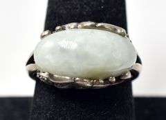 Unique Ring with Light Green Stone and Intricate detailing on Housing in Sterling Silver 8grams Size