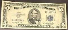 Choice AU 1953 $5 Star Silver Certificate.