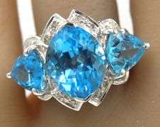 14kt White gold blue topaz and diamond ring