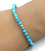 Turquoise and gold bead bracelet