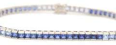 10kt White gold princess cut synthetic sapphire channel set bracelet