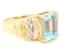 Tasteful 14K YG Blue Topaz & Diamond Ring