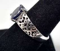 Gorgeous Blue Stone Ring with Heart Detailing on Band in Sterling Silver 4.2grams Size 8.5
