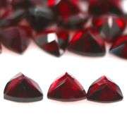 Deep burgundy 14.10ct trillion cut untreated Garnet set