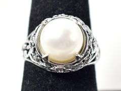 White pearl Ring with Floral Design in Sterling Silver 5.1grams Size 7.5