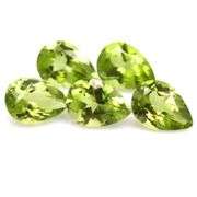 Dazzling 3.83ct untreated apple green Peridot set