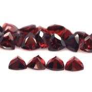 Deep burgundy 14ct trillion cut untreated Garnet set