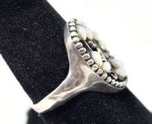 Cut Out Floral Design Ring with White Stones in Sterling Silver 4.1grams Size 7.5