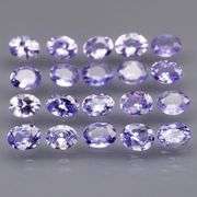 Heavy flashing 2.88ct oval cut Tanzanite set