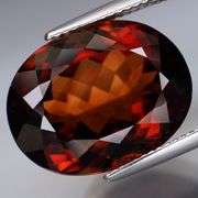 Outstanding 21.89ct eye clean whiskey red Imperial Topaz