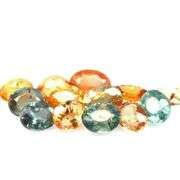 Heated only! 6.85ct fancy color Sapphire set
