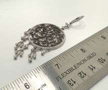 One pair hand made Italian 18KT white gold with 3.57 cttw natural diamond  marcasite scroll dangle e