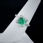 18K WHITE GOLD EMERALD AND DIAMOND RING 1.89 C.T.W.