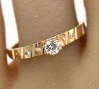 14kt Yellow gold 0.15ct round brilliant cut diamond solitaire ring