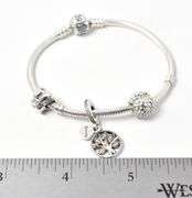 Pandora Bracelet with Charms in Sterling Silver. 24.5 grams.