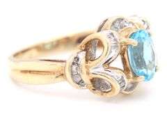 10kt Yellow gold blue topaz and diamond ring