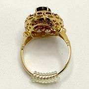 18kt Yellow Gold Oval Garnet & Halo Garnet Ring