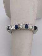 CERTIFIED PLATINUM DIAMOND AND SAPPHIRE BAND