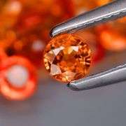 High grade 4.50ct round cut Songean Sapphire set