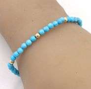 Turquoise and gold bead bracelet