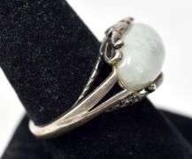 Unique Ring with Light Green Stone and Intricate detailing on Housing in Sterling Silver 8grams Size