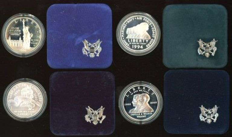 4 Different Commemorative US Silver Dollars in Velvet Boxes