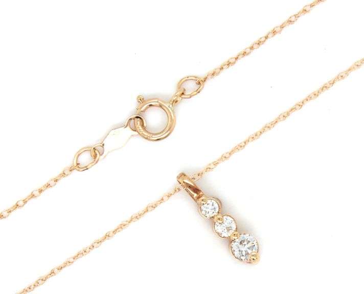 14kt Yellow gold 0.15ctw diamond graduated 3 stone pendant on chain